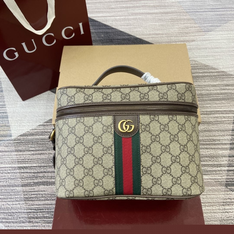 G*u*i cosmetic bags